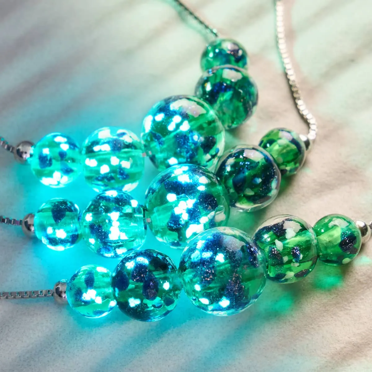 Blue Shamrock | .925 Sterling Silver | Firefly Glass Infinity Clasp Necklace