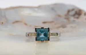 Exquisite White Gold Blue Topaz & Diamond Ring