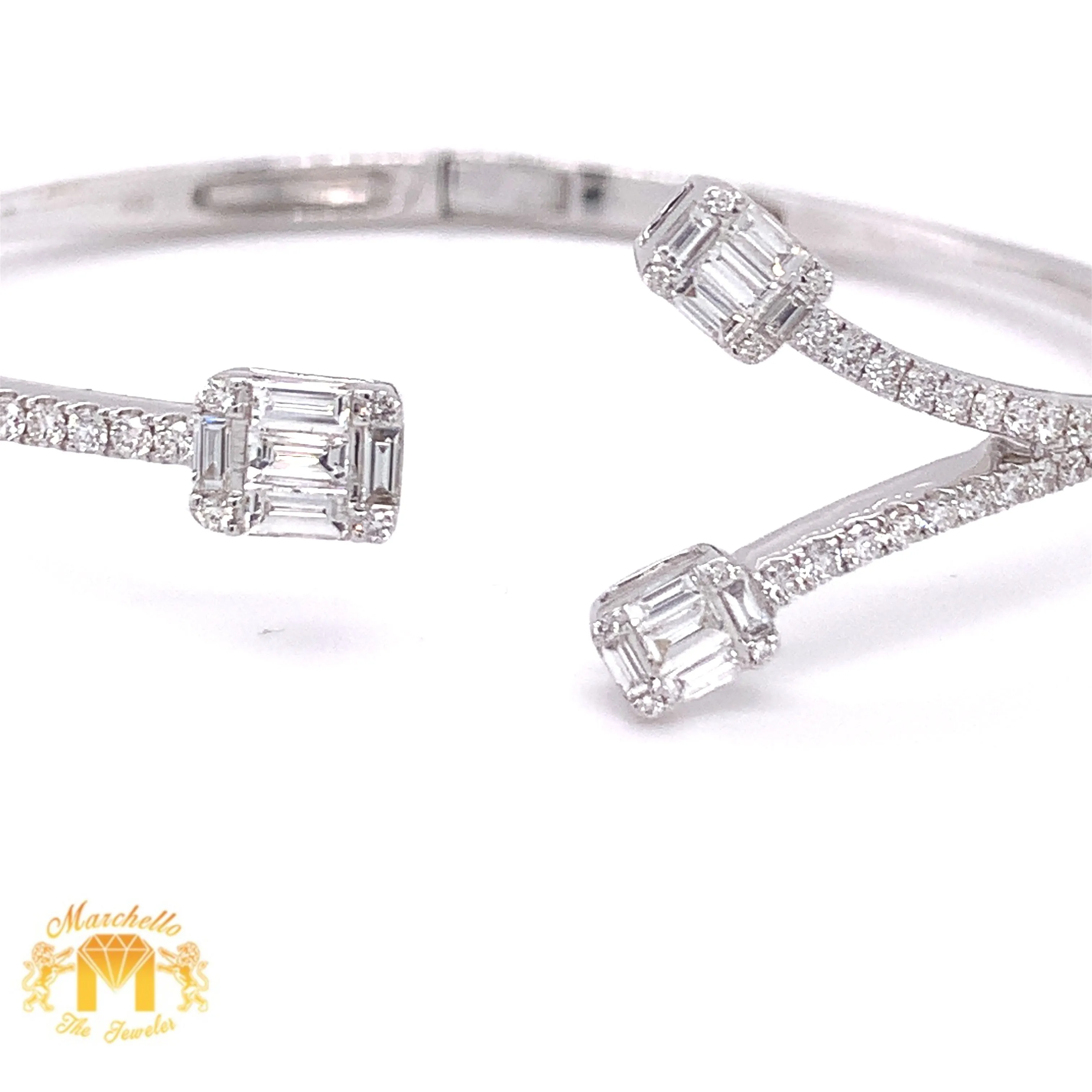 VVS/vs high clarity diamonds set in a 18k White Gold Bangle Bracelet with (fancy Baguette & Round Diamond)